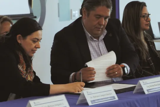 A panel of two women and a man