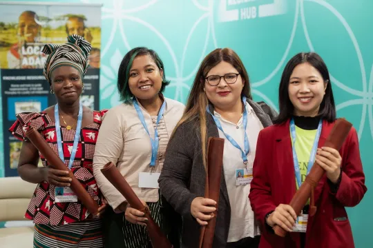 Four women at COP29