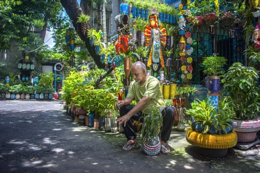 A nature-loving senior citizen in Kolkata, India, uses discarded tyres and containers to create a museum of trees.